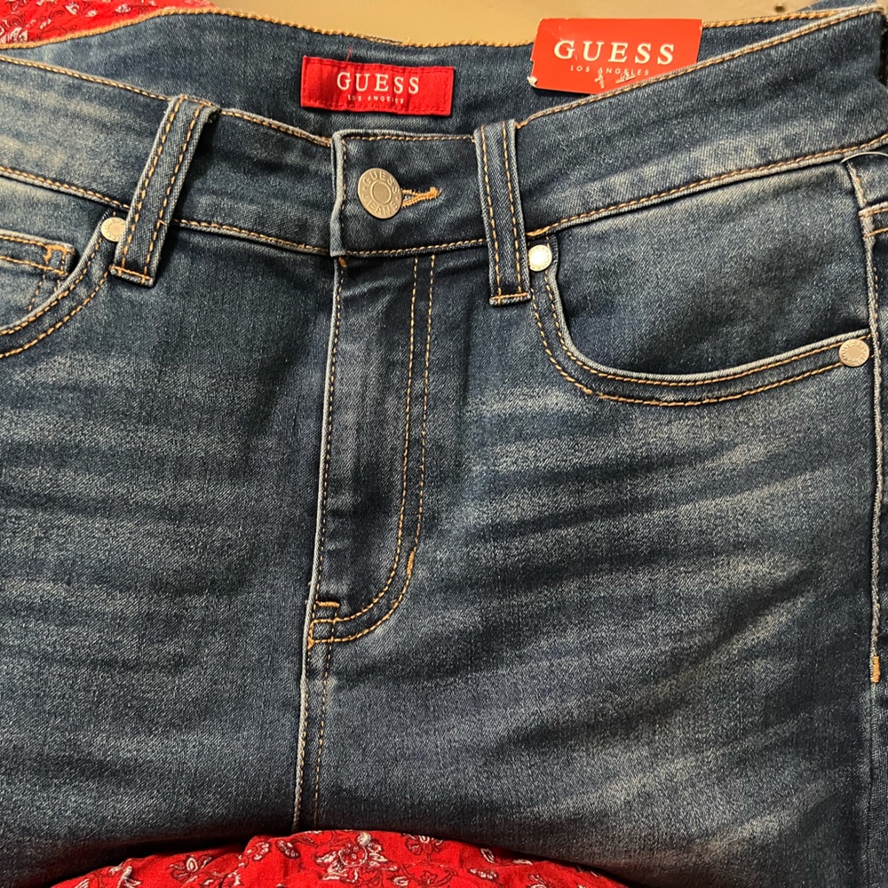 it's a blue and gray pants it's a guess brand pants